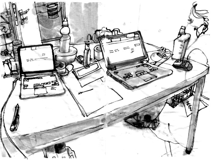 ink drawing of a desk with two laptops