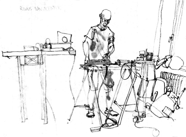 ink drawing of Rinus Van Alebeek on stage, behind a desk with varius electric devices