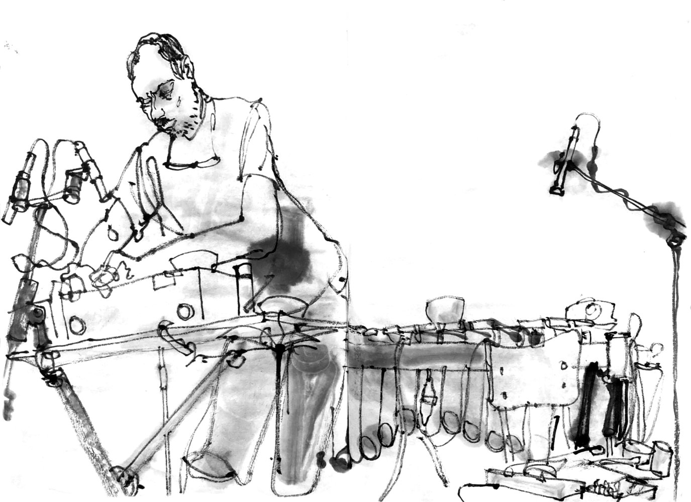 inkdrawing of a musician on stage, standing behind some electro-acustic device