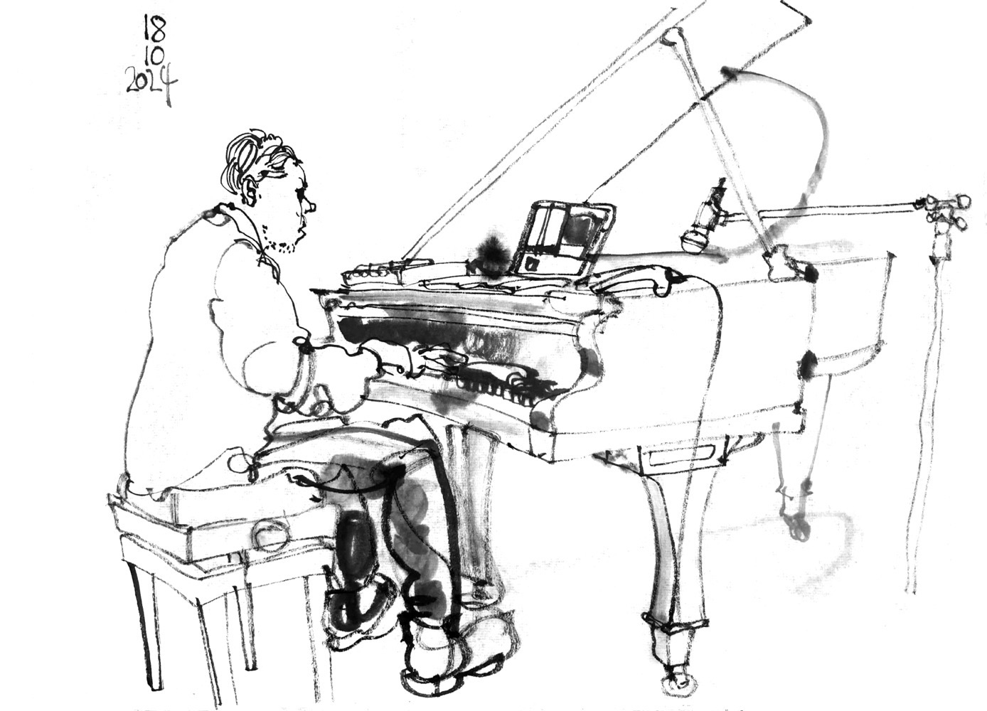 Ink drawing of a man playing piano + electronics, laptop on top of it.